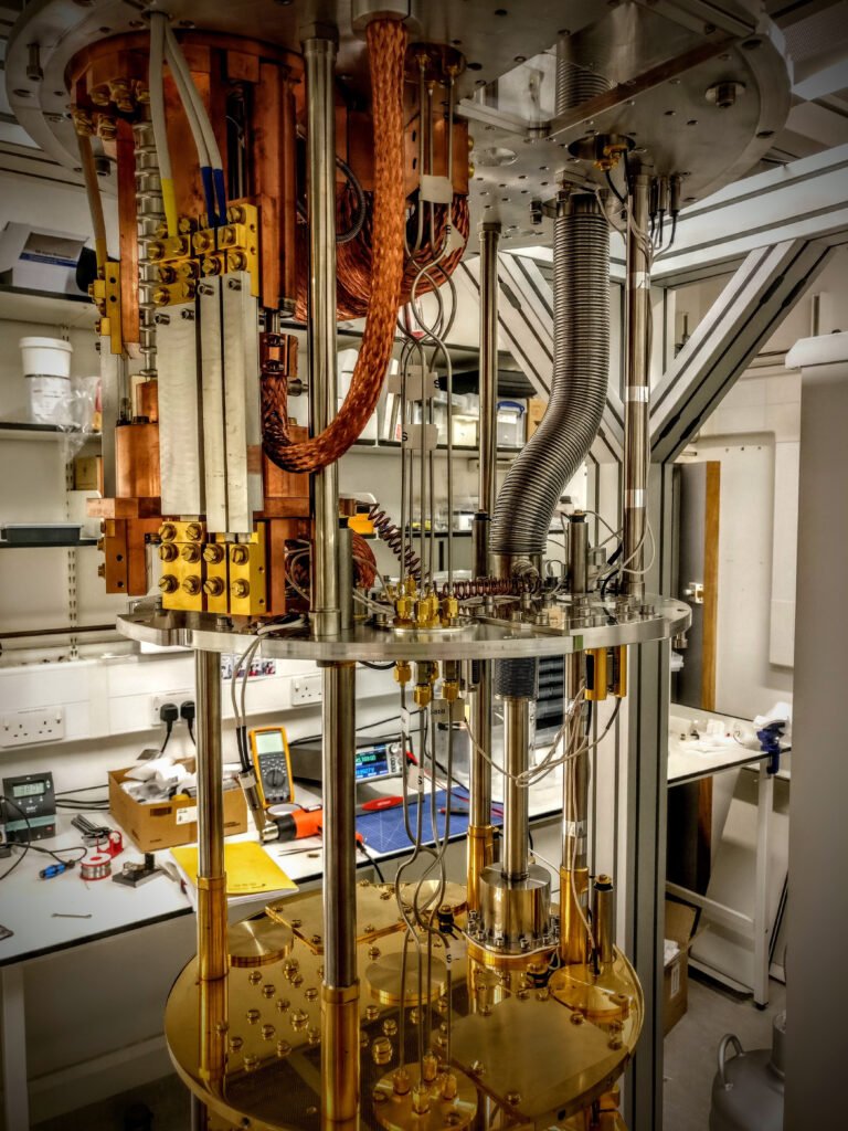 Interior view of a dilution refrigerator used to cool quantum computing hardware close to absolute zero