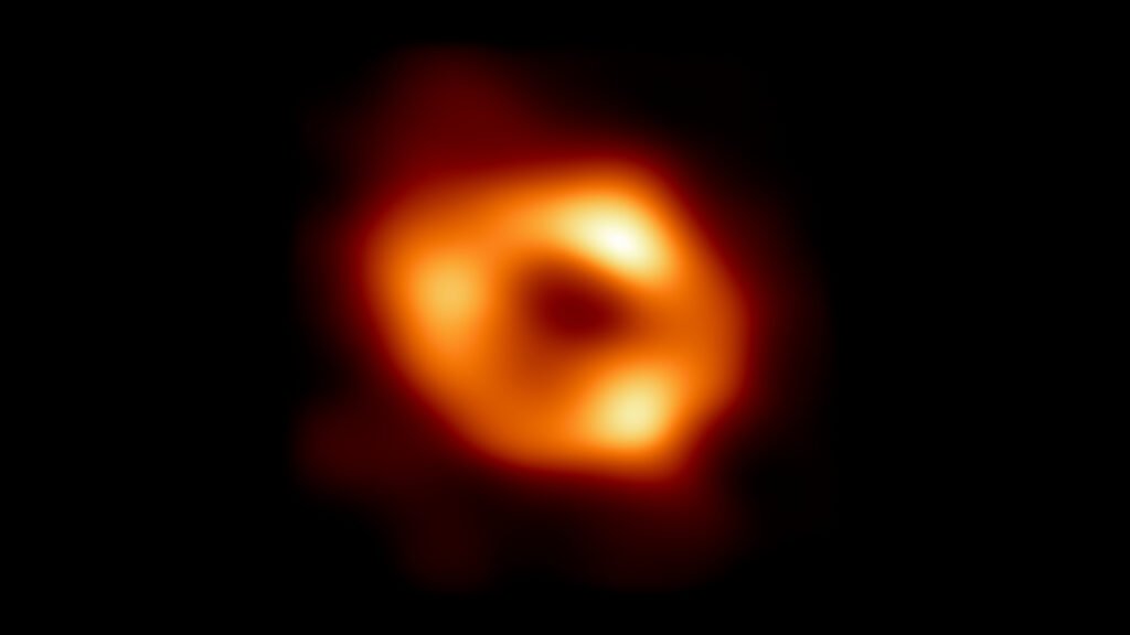 First image of Sagittarius A*, the supermassive black hole at the centre of the Milky Way, captured by the Event Horizon Telescope in 2022, showing a bright ring of hot plasma around a dark central shadow