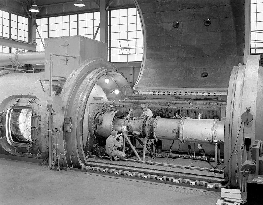 A Marquardt RJ43-MA-3 ramjet engine being installed in a test chamber, showing its simple inlet-to-nozzle construction with no compressor
