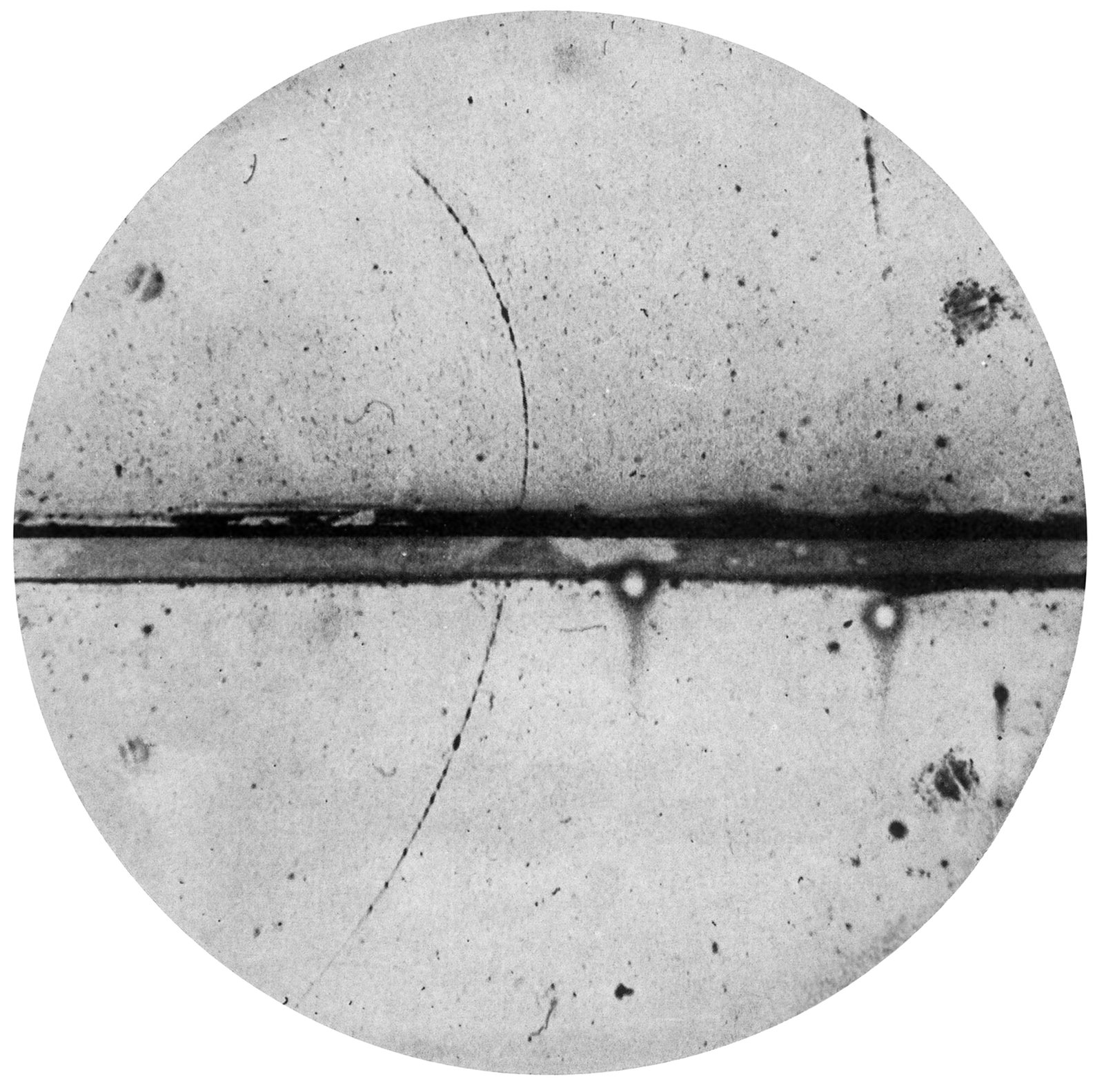 Cloud chamber photograph of the first observed positron track, 1932